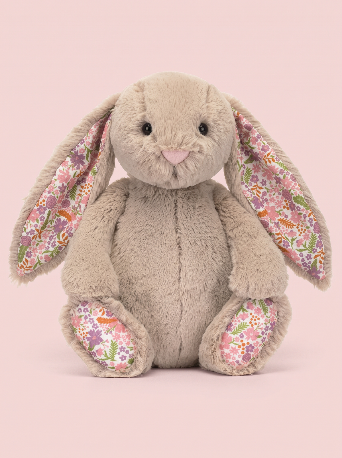Floral Ear Bunny Plush Toy front view on a pink studio background