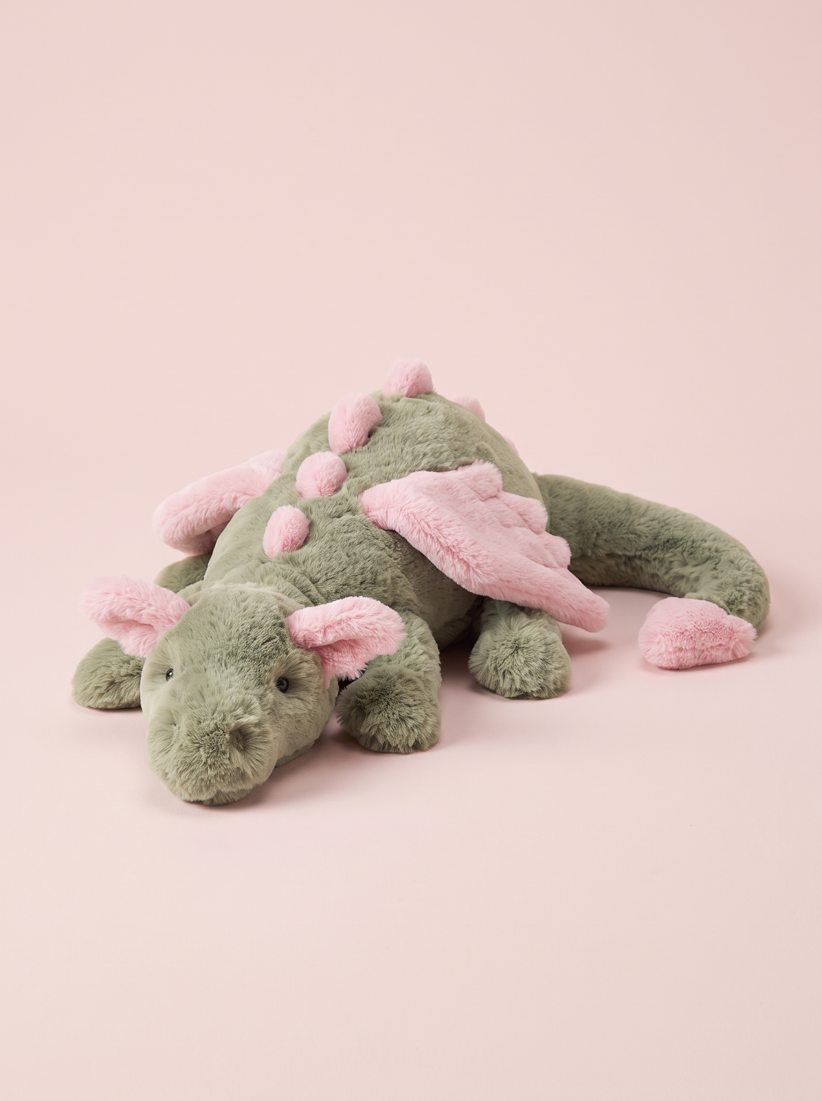 Green and Pink Dragon Plush Toy angled studio view