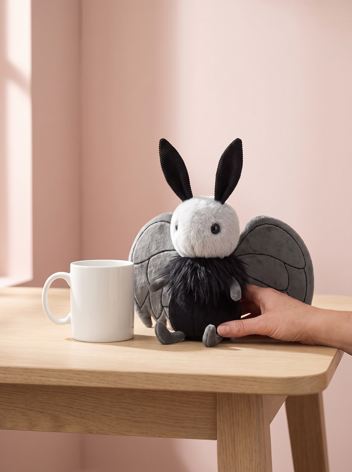 Moth Plush Toy styled in a home setting