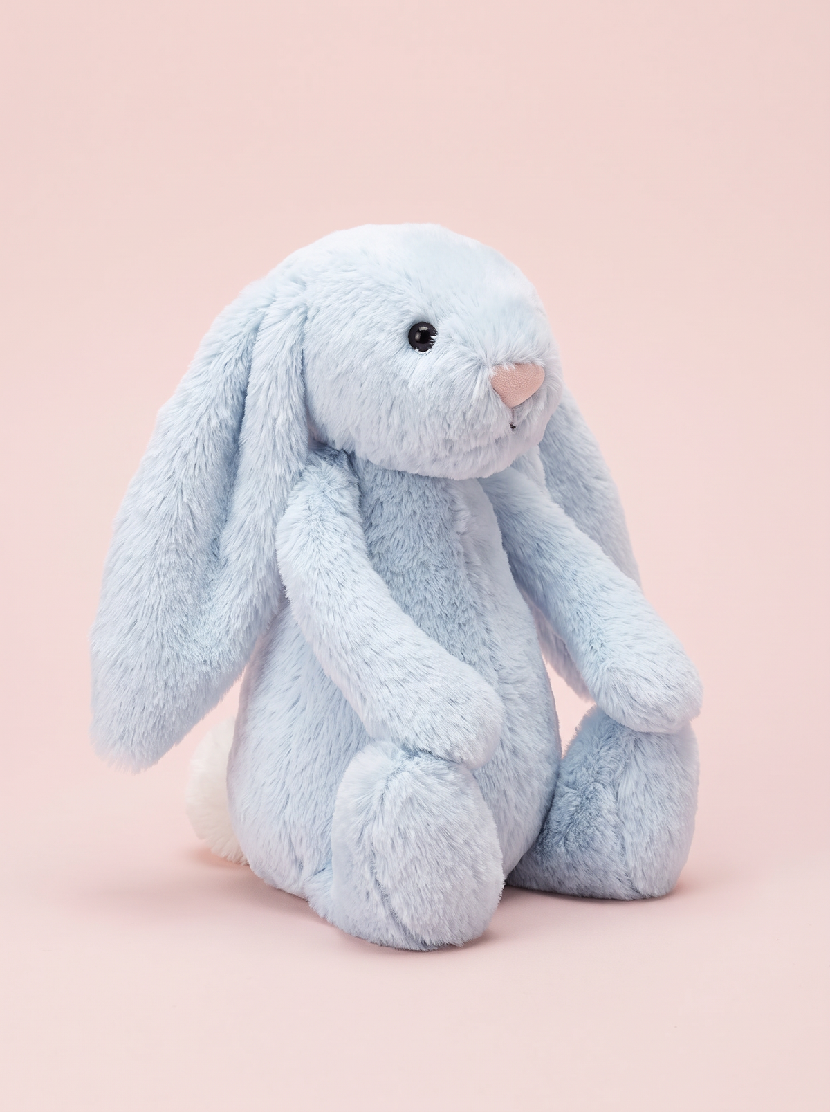 Pale Blue Bunny Plush Toy angled studio view