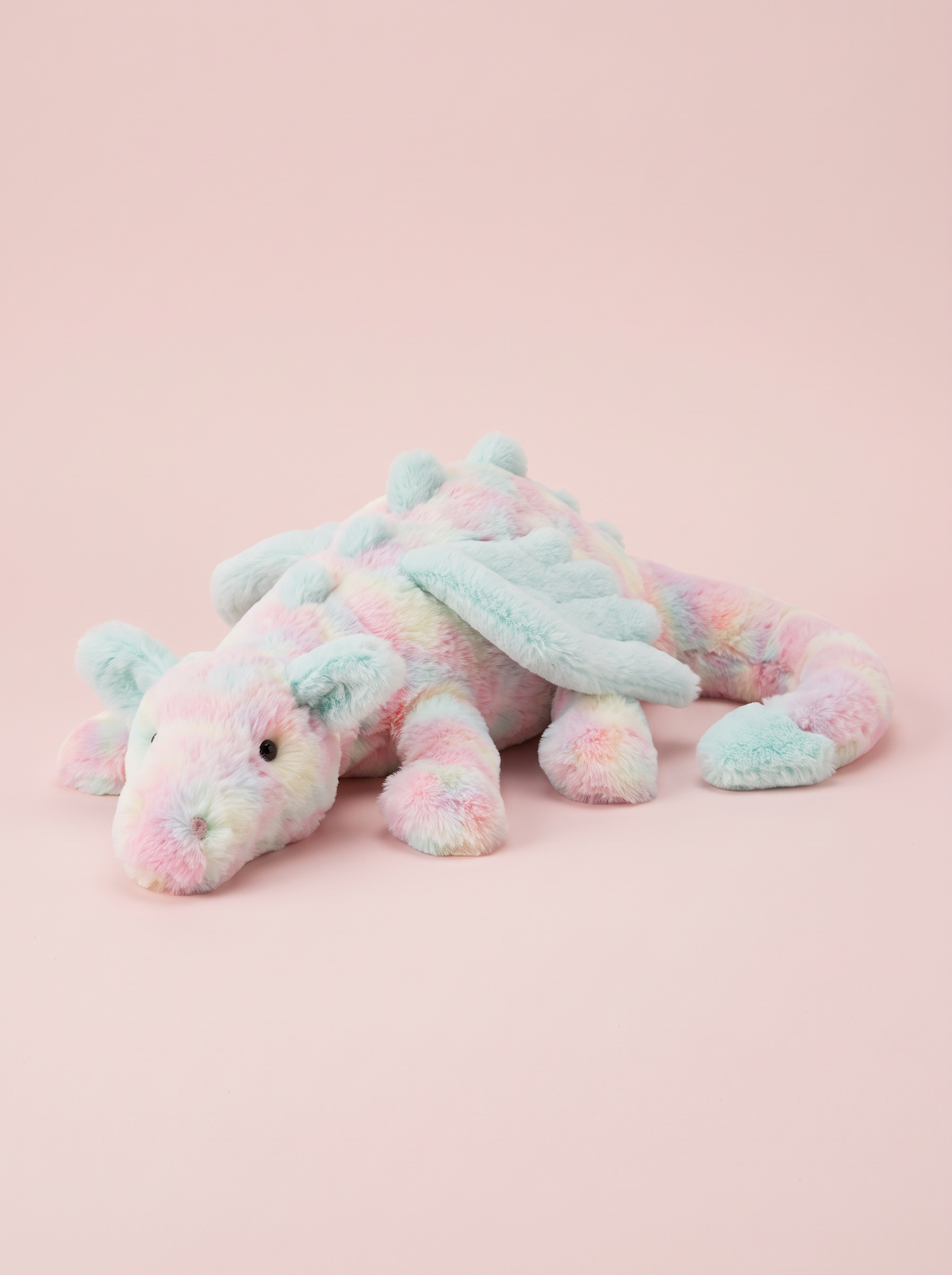 Pastel Rainbow Dragon Plush Toy angled studio view