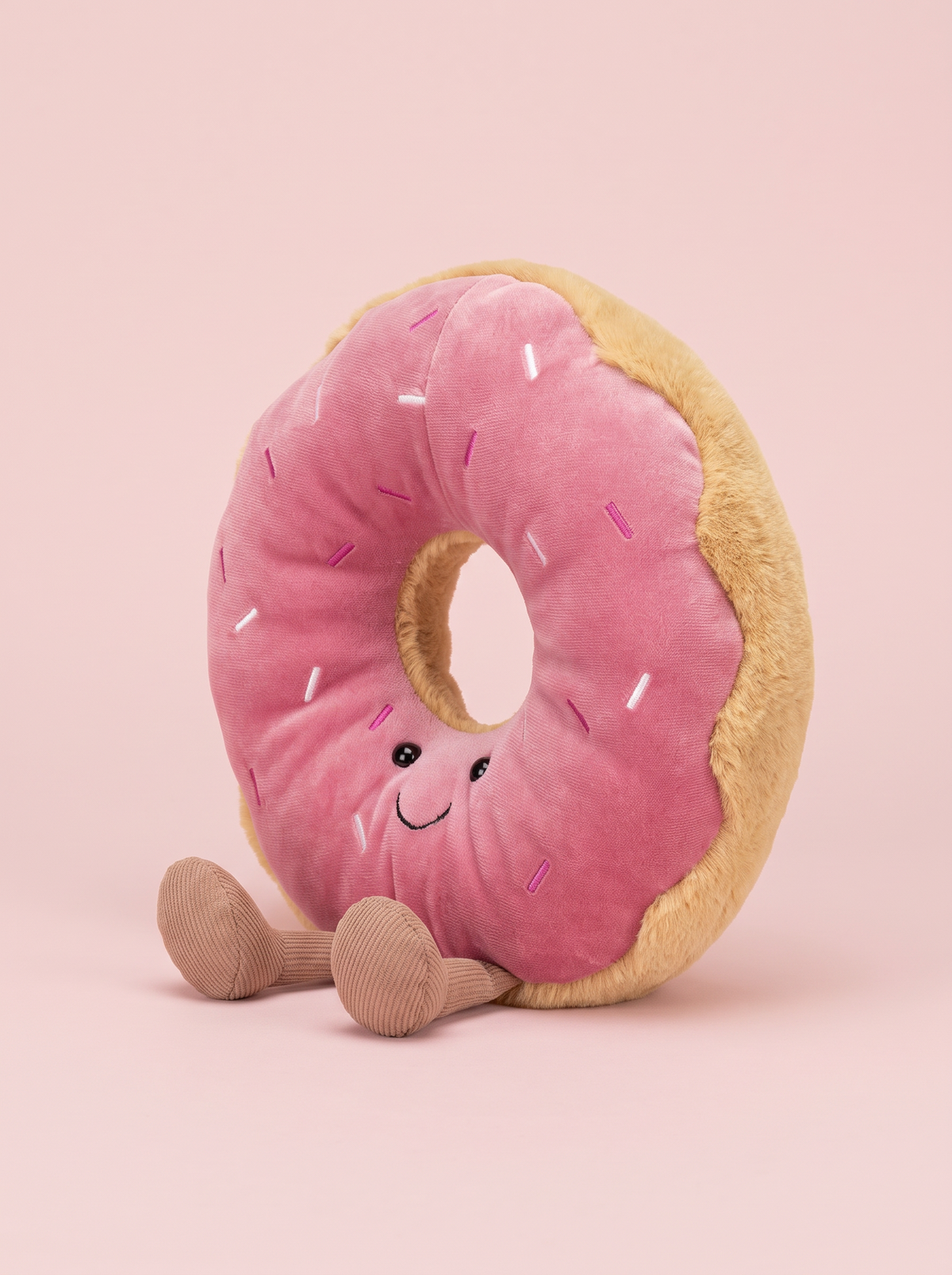 Pink Frosted Doughnut Plush Toy angled studio view