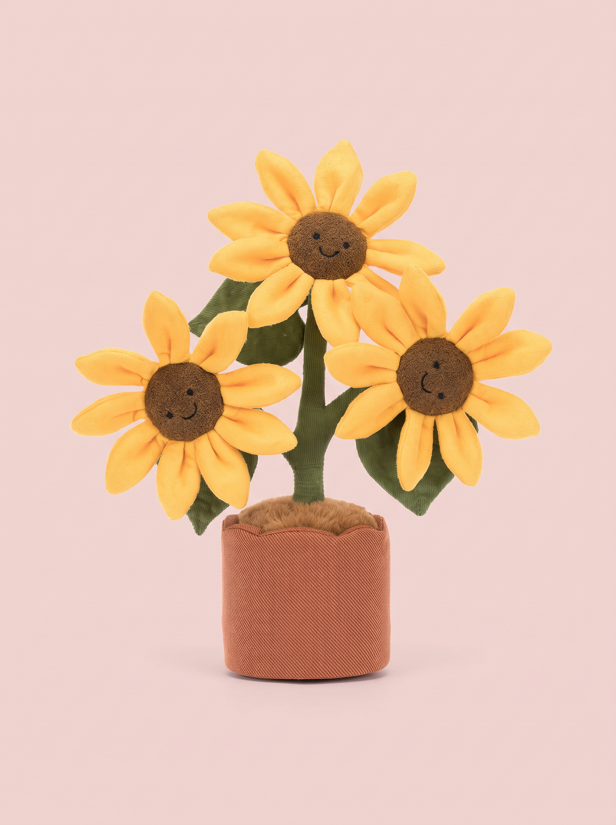 Potted Sunflower Plush Toy front view on a pink studio background