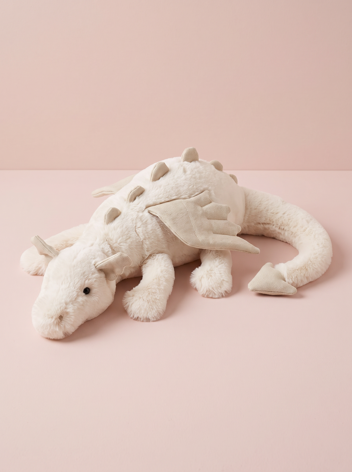 White Dragon Plush Toy angled studio view